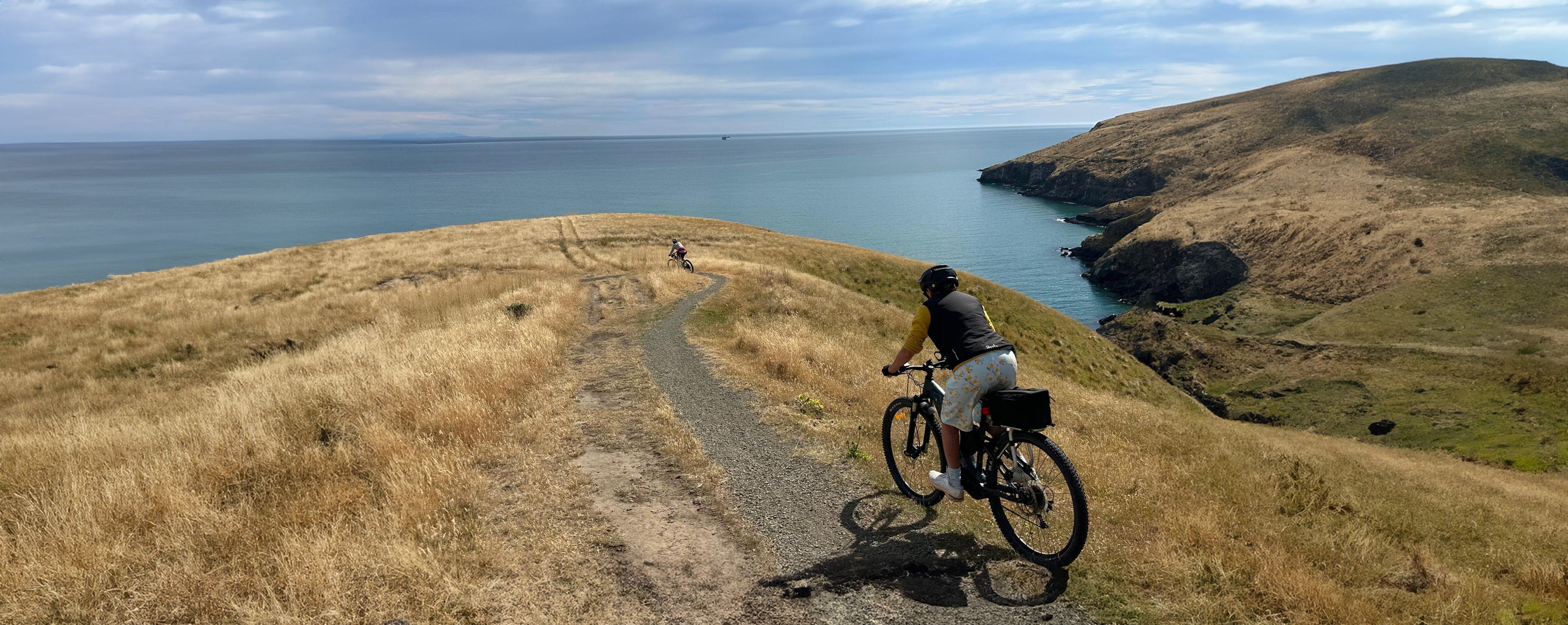 suzanne with buttercup shorts riding down anaconda trail in christchurch